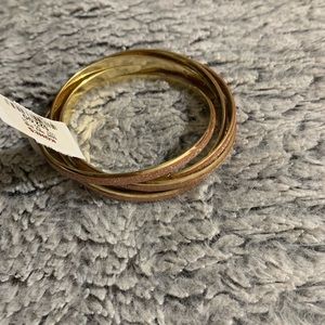 Set of gold and rose gold bracelets